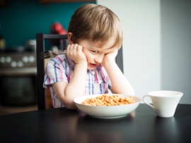 Offended little boy refuses to eat dinner - spaghetti